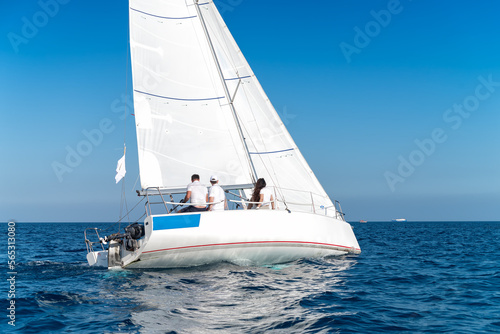 Crew in a yacht. Sailing yacht race regatta. Yachting sport © kirill_makarov