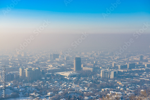 View of the city Almaty from above during the smog in winter. Kazakhstan