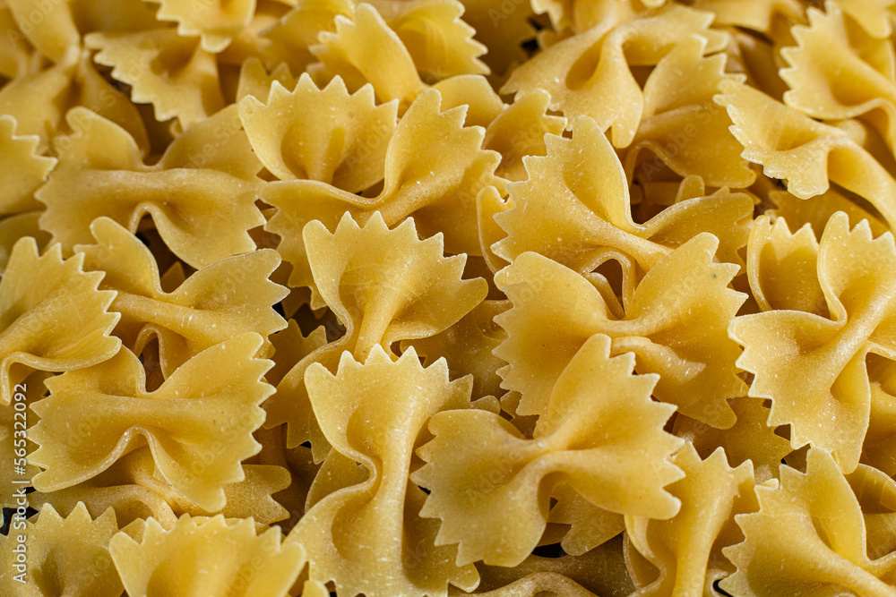 Raw pasta close-up. Pasta background Raw pasta close-up. Pasta background