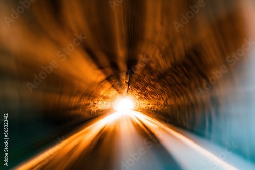 Illustration photo of rushing trough a tunnel with light speed, speed shot, motion blur