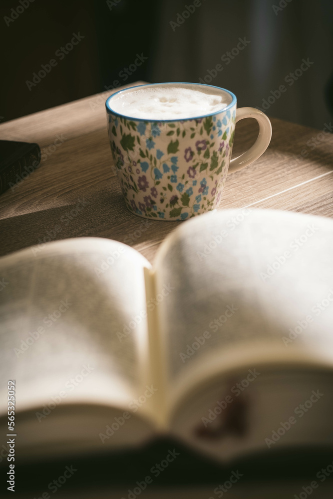 High Angle View Of Coffee Cup On Warm Clothing. High Angle View Of Coffee Cup On Warm Clothing.