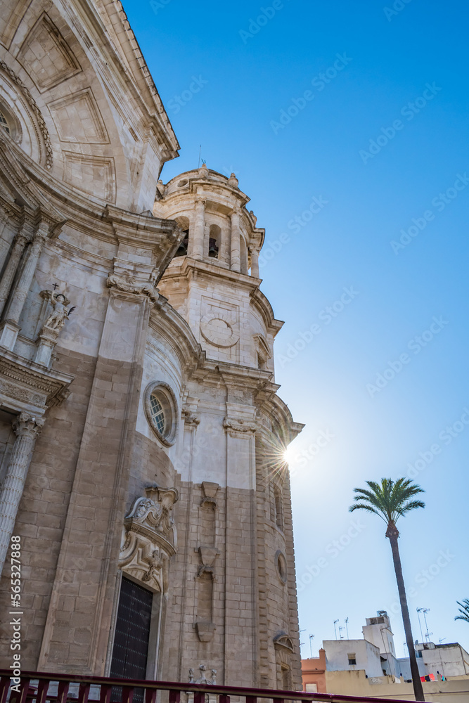 Sun rays on the facade of the Cathedral of La Santa Cruz with bell tower, Cádiz SPAIN