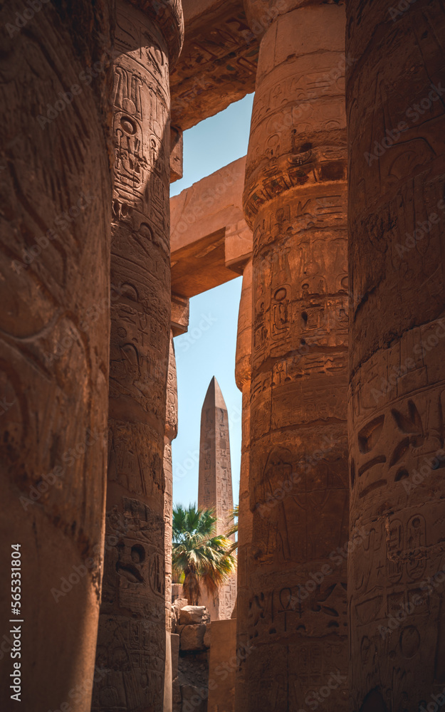 Vertical image of obelisk between the columns of the Temple of Karnak (Luxor) Egypt Vertical image of obelisk between the columns of the Temple of Karnak (Luxor) Egypt