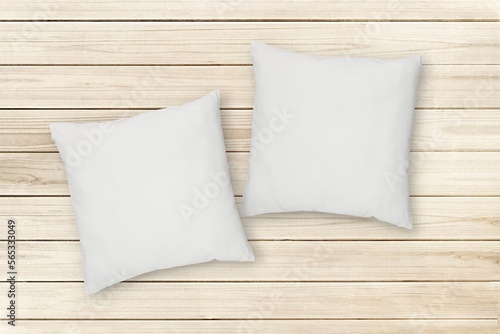 Two white cotton pillows mockup for design presentation, cushion, pillow cover mockup, wooden background.