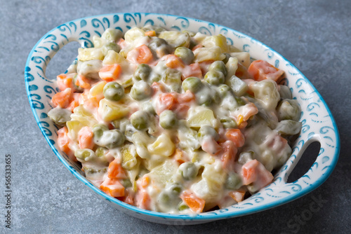 Russian salad Olivier with mayonnaise and egg served (Turkish name; Rus salatasi)