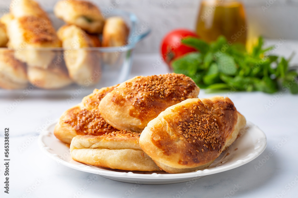 Turkish cuisine; Handmade Cheese spinach Pastry (Turkish name; peynirli - ispanakli pogaca)