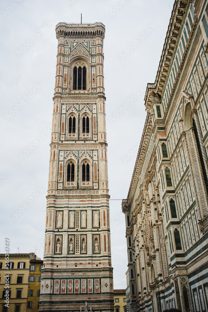 Catholic Cathedral of Santa Maria del Fiore. Giotto's bell tower. Reliefs and frescoes on marble walls. Renaissance Era
