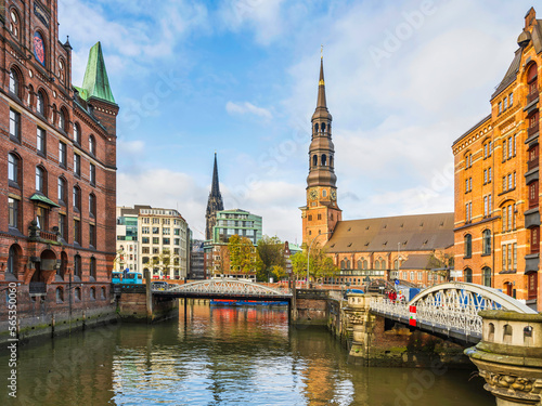 Speicherstadt  City of Warehouses and the Hauptkirche St Katharinen tower on the canal in  Hamburg  Germany