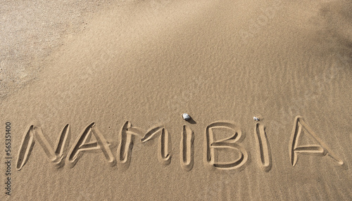 "Namibia" written in the sand of the desert