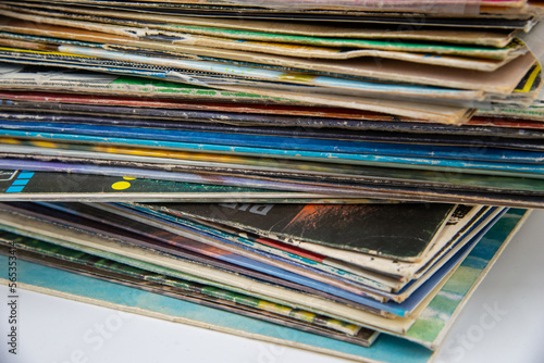 Group of old vinyl singles in original sleeves, 7 inches records covers.