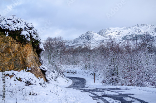 snowy landscape of a snow covered mountain road in Galicia, Spain.