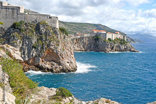 Dubrovnik West Harbor and view to the ancient city wall on the rocks, Dubrovnik, Croatia  © hnphotography