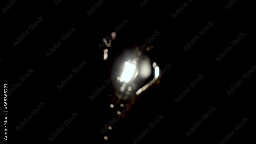 a man blows a saxophone against the light. Contours of the body, contours of the tool a man blows a saxophone against the light. Contours of the body, contours of the tool