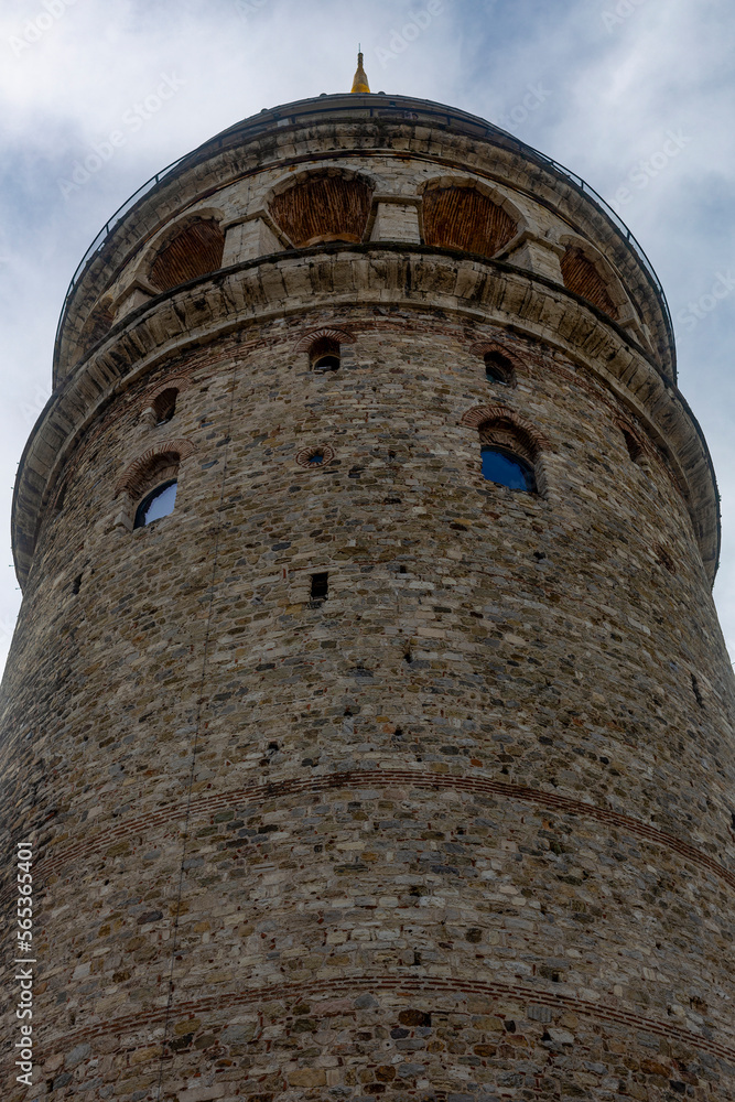 Galata Tower, the symbol of Istanbul. Stone historical building built by Genoese. Galata Tower, the symbol of Istanbul. Stone historical building built by Genoese.