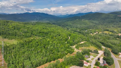 Flying over the Campton Mountain in summer with White Mountain National Forest at the background in town of Campton, New Hampshire NH, USA.  photo