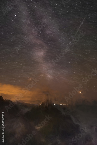 Digital painting of the Milky Way over Llanddwyn island lighthouse, Twr Mawr at Ynys Llanddwyn on Anglesey © Rob Thorley