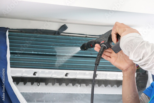 air conditioning cleaning service with water spray