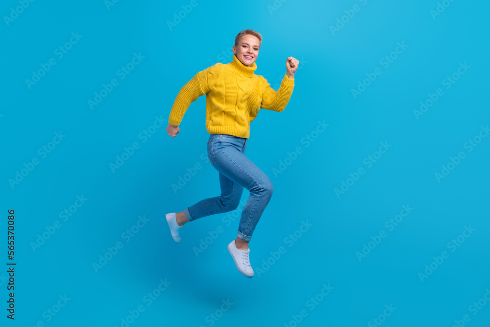 Full body length photo of hurry running air blonde hair lady wear stylish autumn outfit addicted shopaholic isolated on blue color background