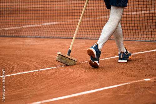 The broom (illustration) is passed to clean the white lines of the clay court during the French Open, Grand Slam tennis tournament on May 24, 2022 at Roland-Garros stadium in Paris, France. photo