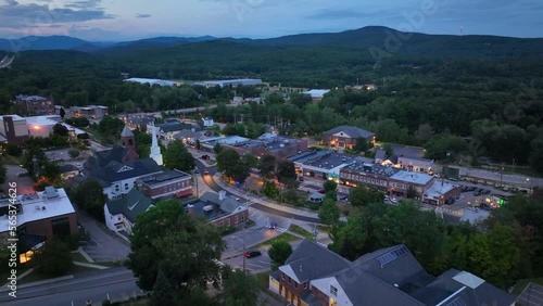 Main Street aerial view at sunset with White Mountain National Forest at the background in summer in town of Plymouth, New Hampshire NH, USA.  photo