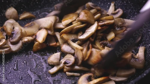 Mushrooms are fried in oil and cut into thin slices to prepare the sauce