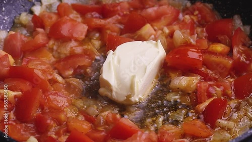 Red spicy sauce with vegetables tomatoes onions carrots