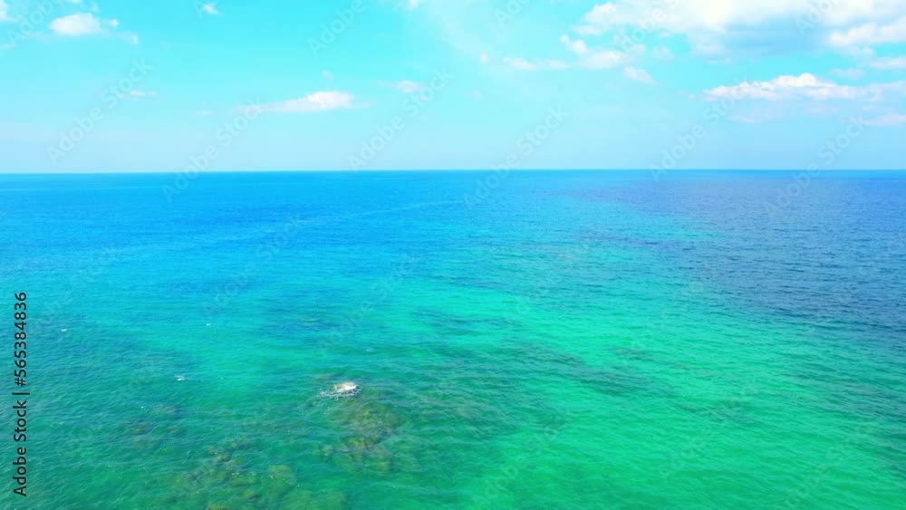Drone aerial view of beautiful over the tropical sea, Clear blue sea water with waves. Phuket, Thailand. Travel and holiday concept. Nature landscape on sunny summer day. 4K UHD
Drone aerial view of beautiful over the tropical sea, Clear blue sea water with waves. Phuket, Thailand. Travel and holiday concept. Nature landscape on sunny summer day. 4K UHD