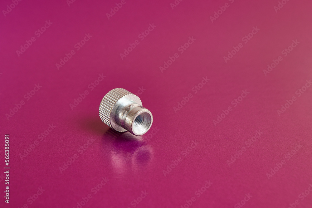 Grooved pressure nut for manual screwing. The concept of threaded connection elements. Grooved pressure nut for manual screwing. The concept of threaded connection elements.
