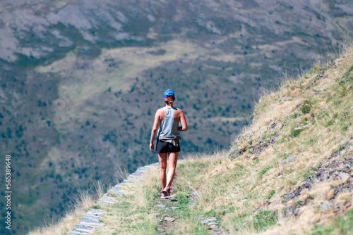 girl from behind hiker in the pyrenees