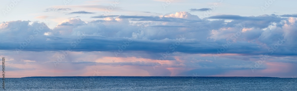 Colorful cloudscape over an island Colorful cloudscape over an island