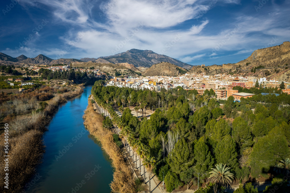 Panoramic view of the town of Blanca, in the Ricote Valley, Murcia, Spain. The Segura river, with lemon orchards and the city in the background, river, Segura, Murcia, Spain