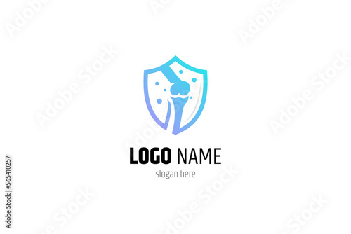orthopedic bone icon logo in shield design
