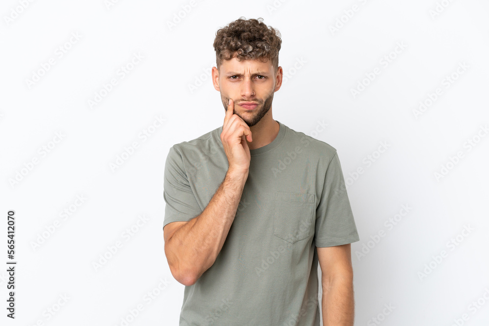 Young caucasian handsome man isolated on white background and thinking Young caucasian handsome man isolated on white background and thinking