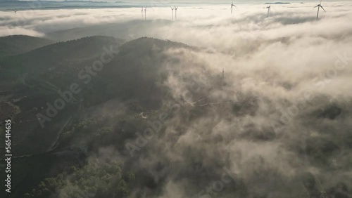 aerial view of a wind farm between the clouds