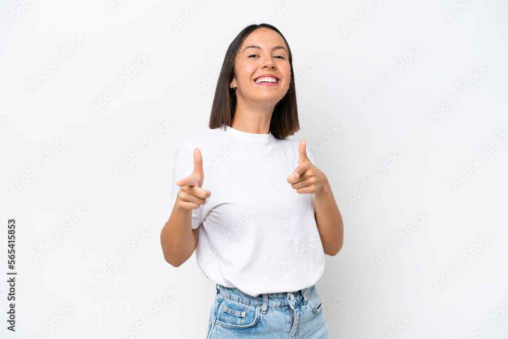 Young caucasian woman isolated on white background surprised and pointing front Young caucasian woman isolated on white background surprised and pointing front