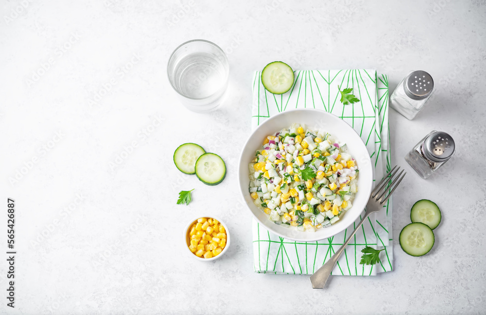 Cucumber corn salad in a bowl