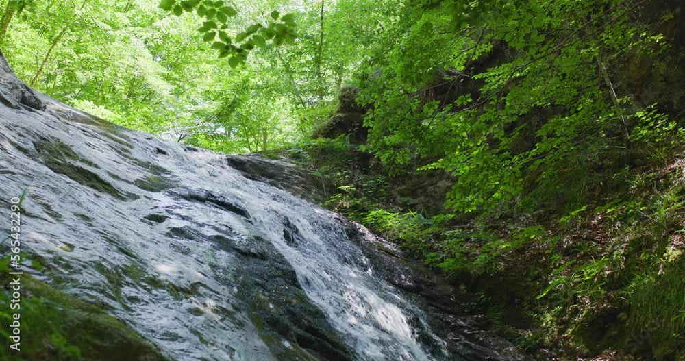 River slide on a rock. Waterfall in the mountains. River slide on a rock. Waterfall in the mountains.