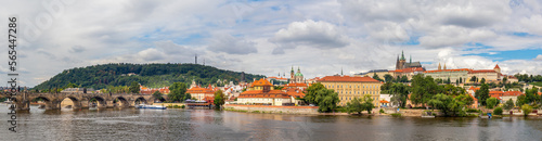 waterfront view across the river Vltava to Castle  Charles Bridge and Petrin Lookout tower  Prague  Czech republic