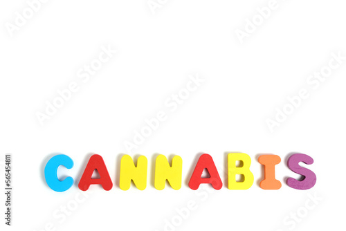 Word cannabis is laid out letters white background.