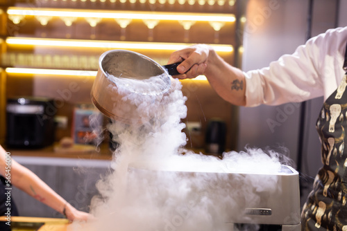 Smoke vapor dry ice in bowl in kitchen