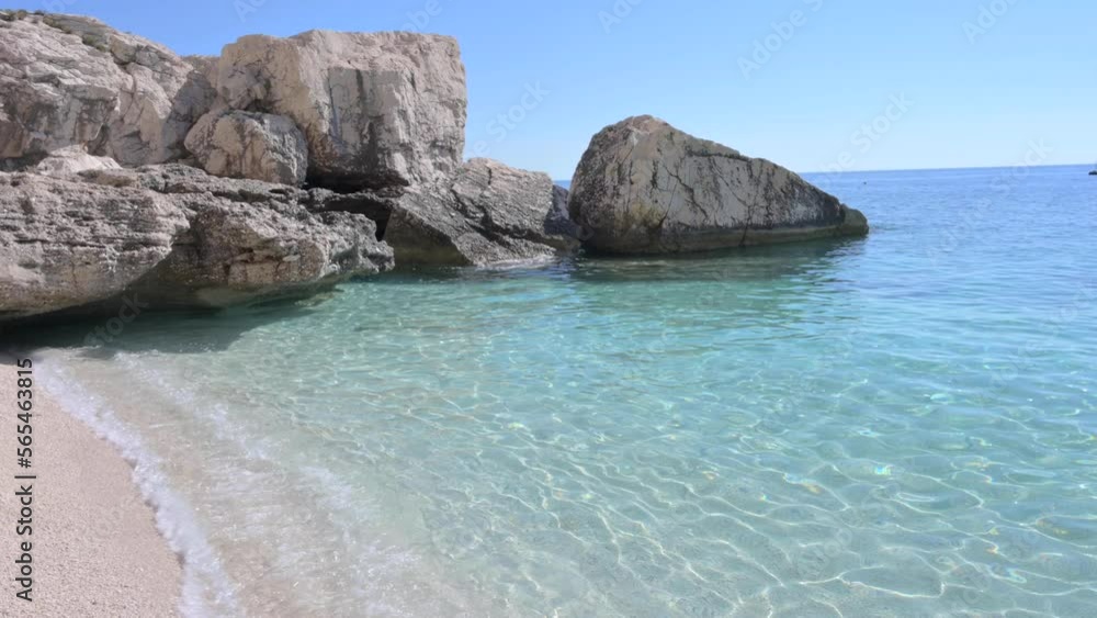 Blue beach in Sardinia. Italian coast, elite resorts. BLUE SKY AND CLEAR WATER. High quality 4k footage Blue beach in Sardinia. Italian coast, elite resorts. BLUE SKY AND CLEAR WATER. High quality 4k footage
