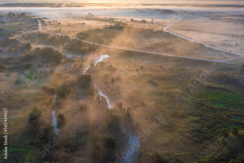 Sunset aerial atmospheric view on river in Ural Russia. Drone photography photo