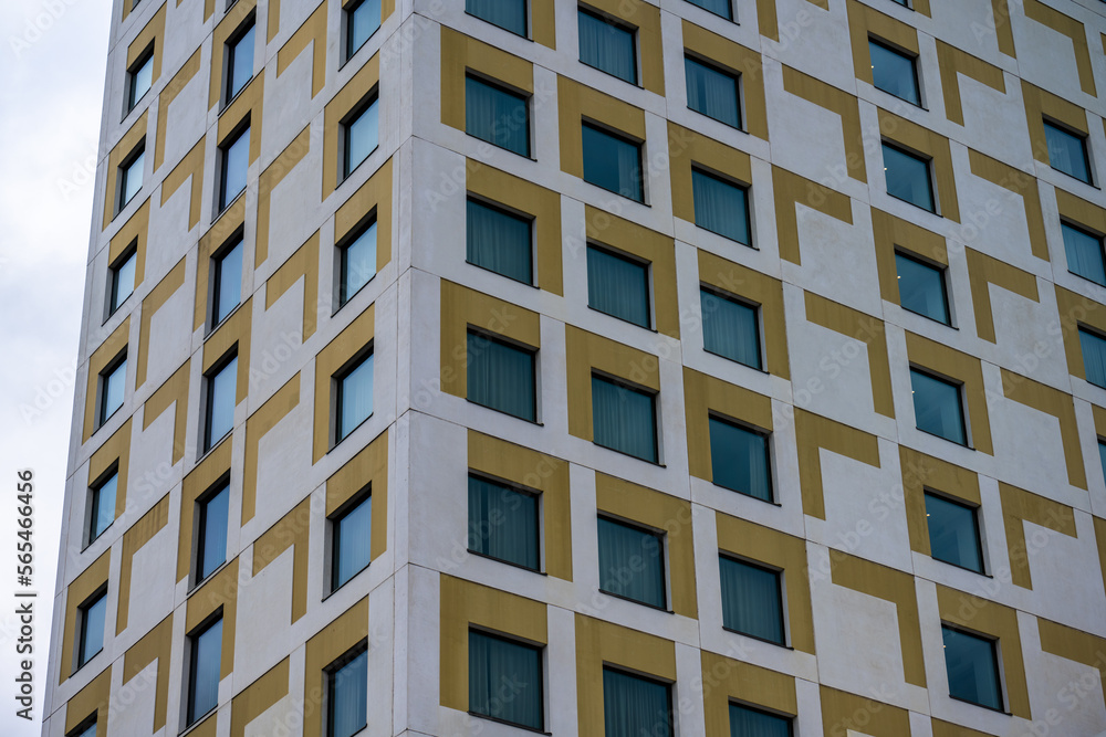 Office high rise with white and green exterior. Office high rise with white and green exterior.