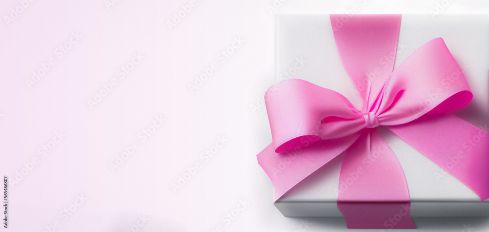 Pink gift box on white background. Love surprise template. Top view. Generative AI Pink gift box on white background. Love surprise template. Top view. Generative AI