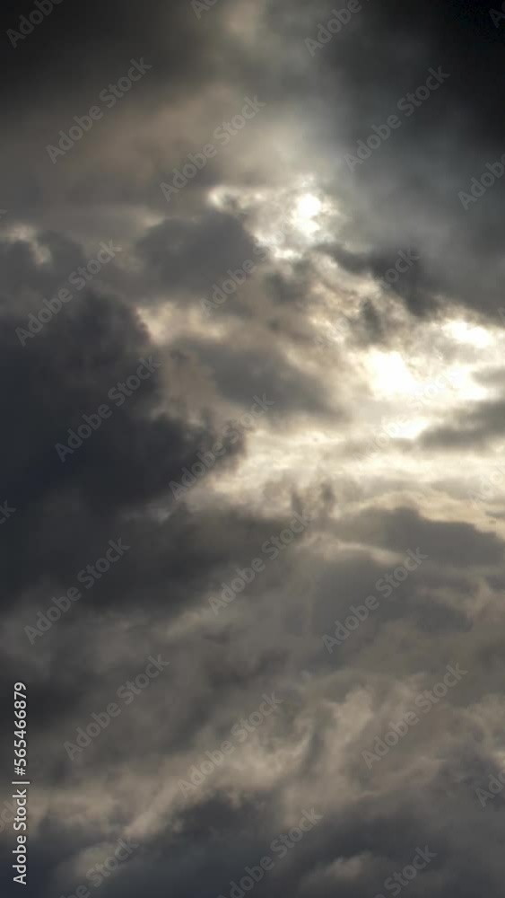 Vertical video of dramatic cloudy sky as a black and white timelapse cloudscape. Vertical video of dramatic cloudy sky as a black and white timelapse cloudscape.