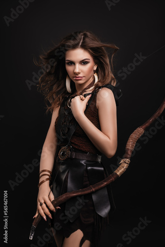 Cuadro en lienzo beautiful young brunette woman with curly hair and make-up, in boho style clothe