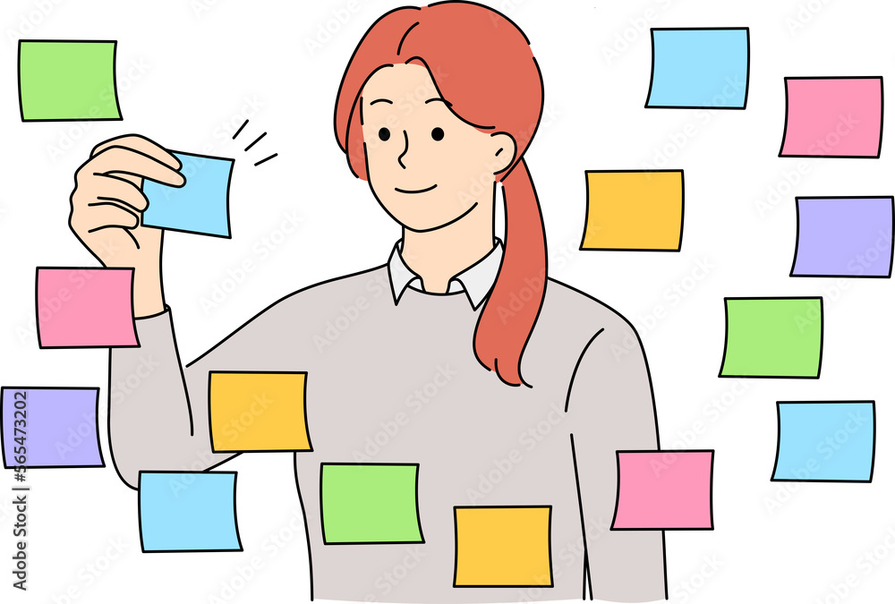 Businesswoman work with sticky notes on board