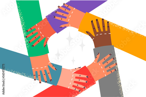 Diverse people hold hands in circle