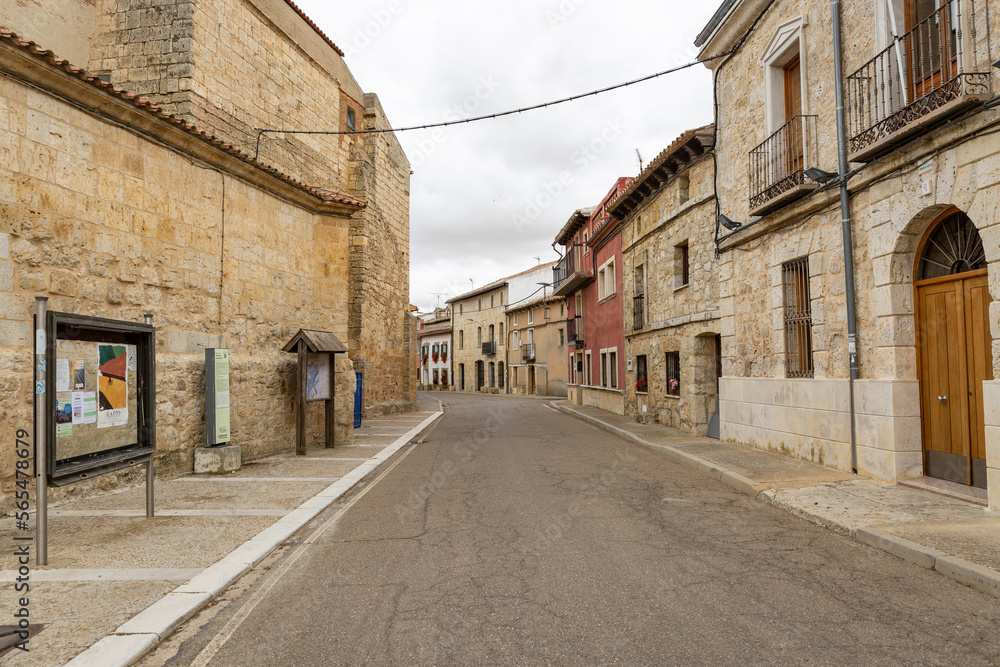 a paved street with typical architecture in Castromonte town, province of Valladolid, Castile and Leon, Spain