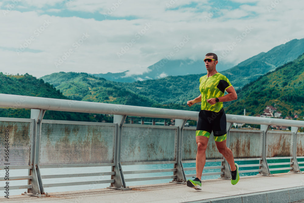 An athlete running a marathon and preparing for his competition. Photo of a marathon runner running in an urban environment